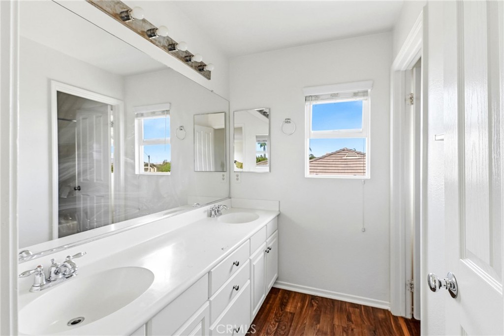 28799 First Star Court Menifee, CA 92584 - Photo 44 of 70 a bathroom with a tub sink and mirror