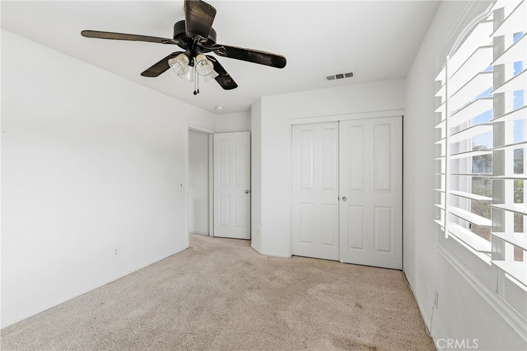 28799 First Star Court Menifee, CA 92584 - Photo 46 of 70 a view of empty room with ceiling fan