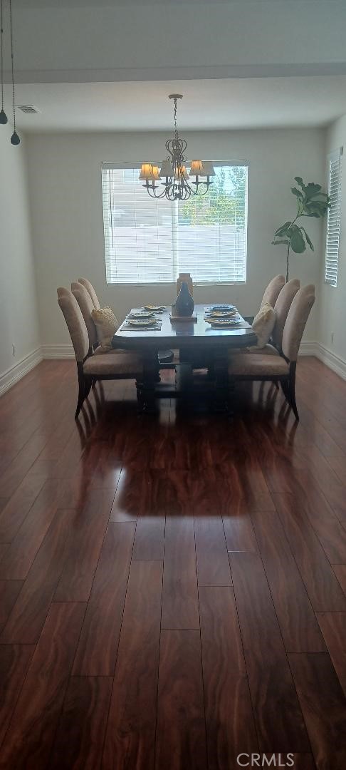 28799 First Star Court Menifee, CA 92584 - Photo 9 of 19 a view of a dining room with furniture and window