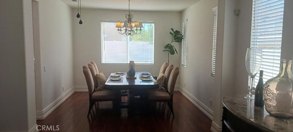 28799 First Star Court Menifee, CA 92584 - Photo 10 of 19 a view of a dining room with furniture and window