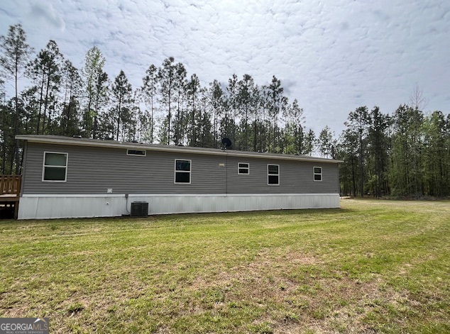 26 Ebenezer Church Road Swainsboro, GA 30401 - Photo 3 of 11 a view of a pool with a yard