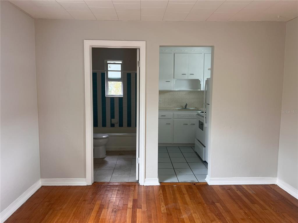 301 24th Avenue North, Unit B St. Petersburg, FL 33704 - Photo 4 of 8 wooden floor in a kitchen