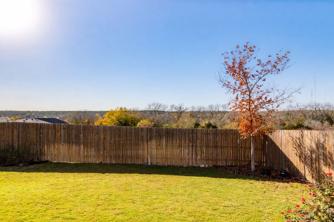 10932 Defender Trail Austin, TX 78754 - Photo 32 of 35 a view of swimming pool with wooden fencing