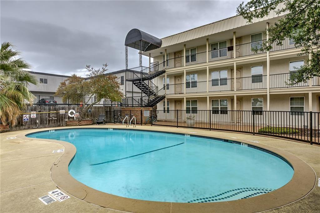 910 Duncan Lane, Unit 16 Austin, TX 78705 - Photo 12 of 15 a view of a swimming pool