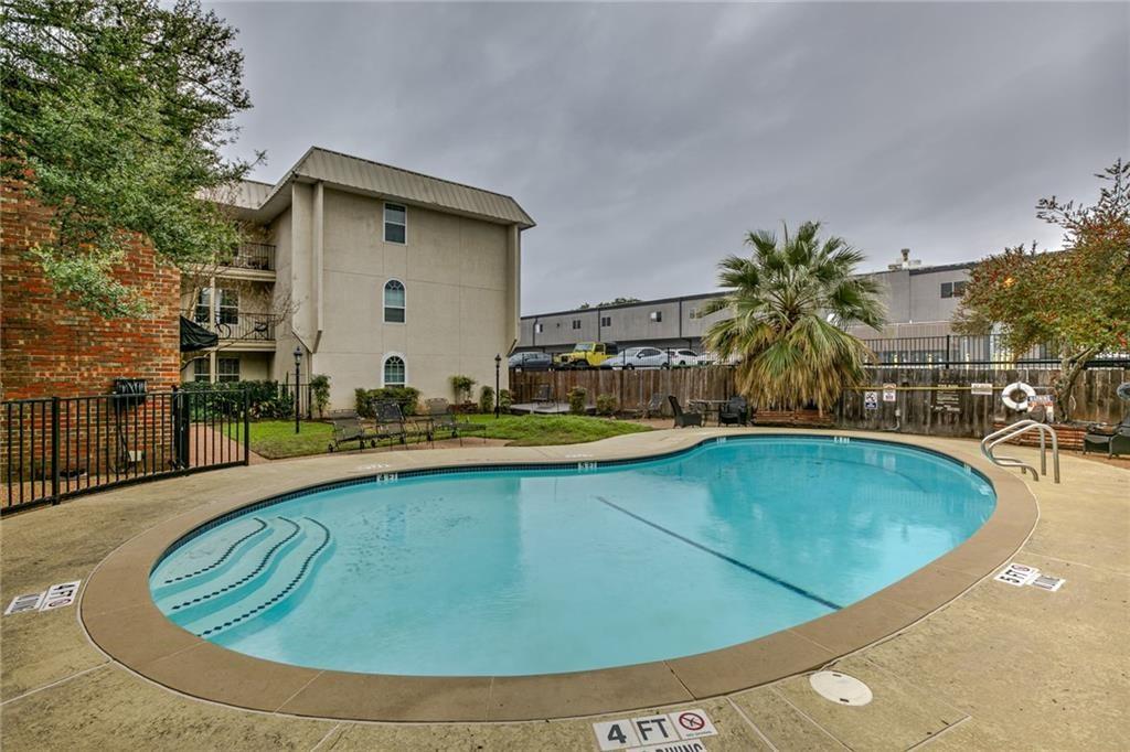 910 Duncan Lane, Unit 16 Austin, TX 78705 - Photo 13 of 15 a view of a swimming pool with outdoor seating