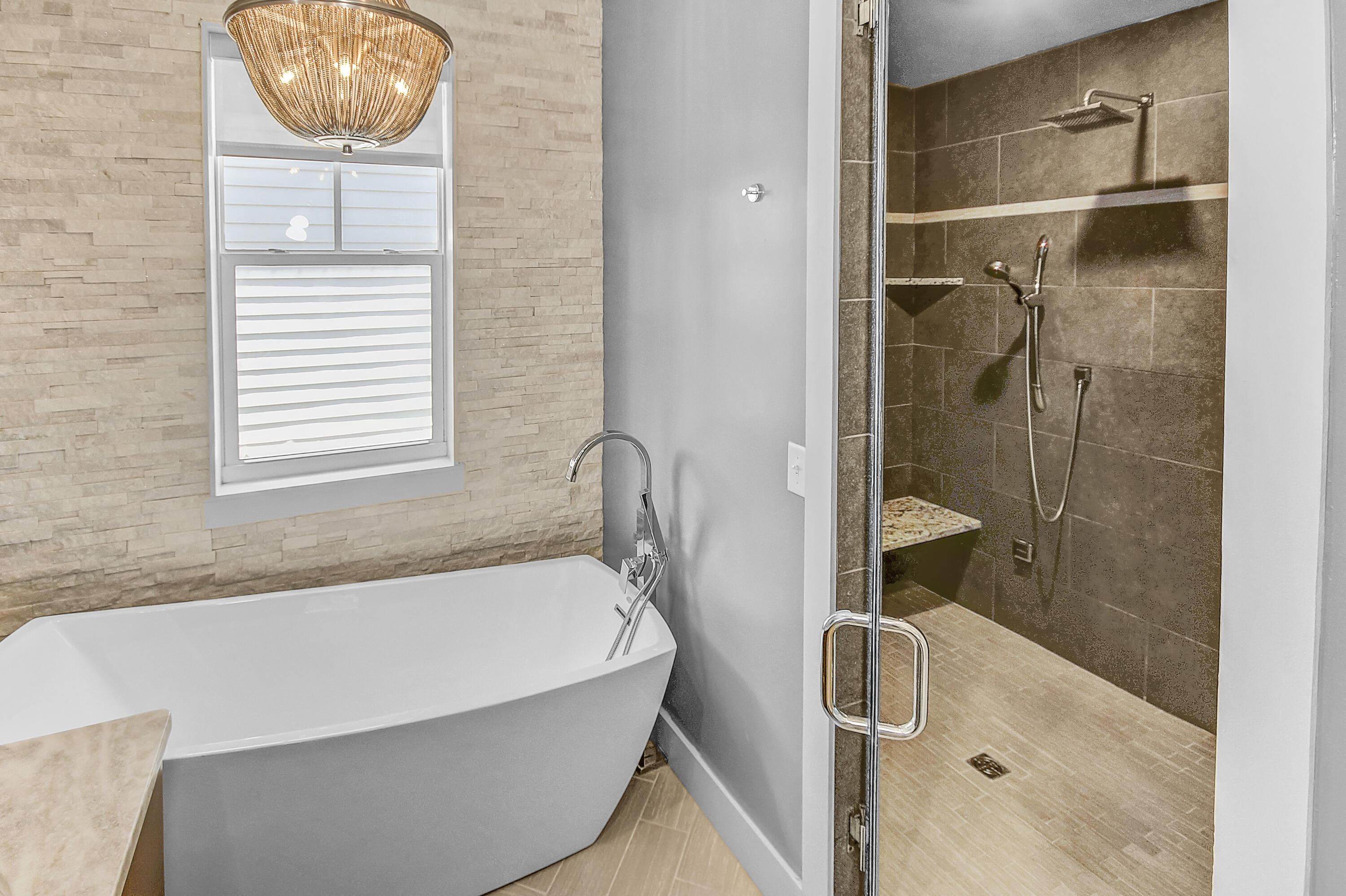 55 Grande Pointe Circle Inlet Beach, FL 32461 - Photo 23 of 32 a bathroom with a tub and shower
