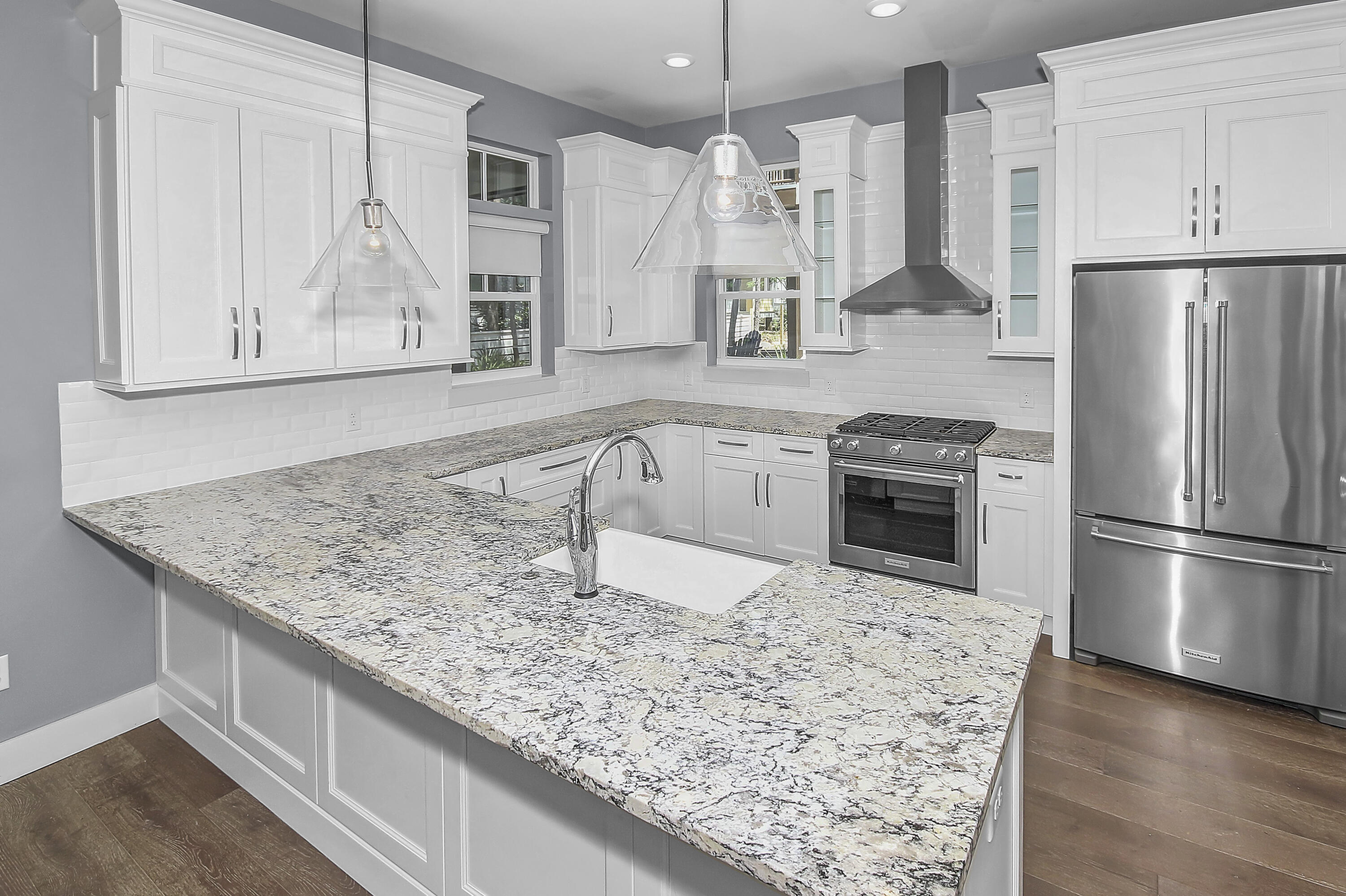 55 Grande Pointe Circle Inlet Beach, FL 32461 - Photo 9 of 32 a kitchen with stainless steel appliances granite countertop a sink stove and refrigerator