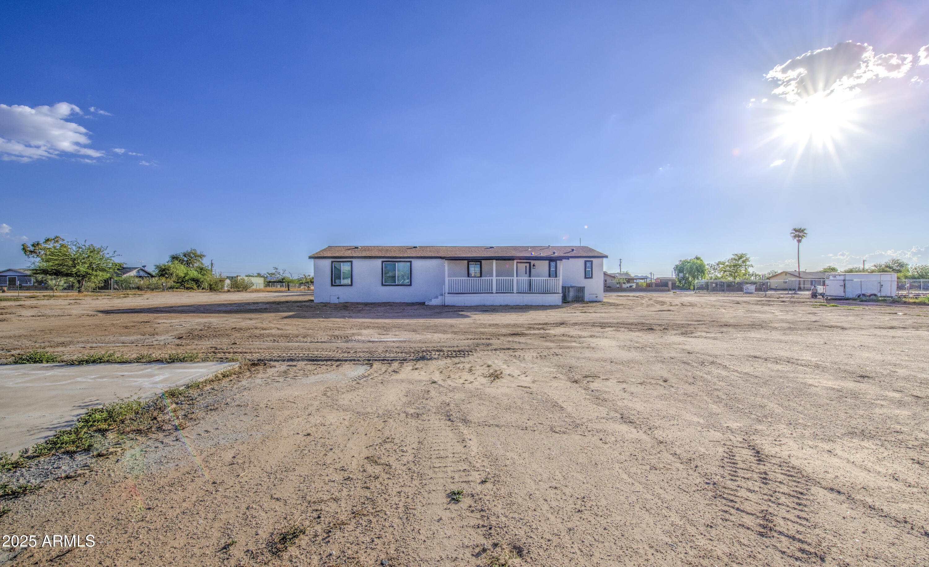 19954 West Teepee Road Buckeye, AZ 85326 - Photo 45 of 46 a house view with a big yard
