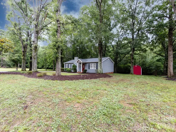 a fire hydrant in the middle of a field