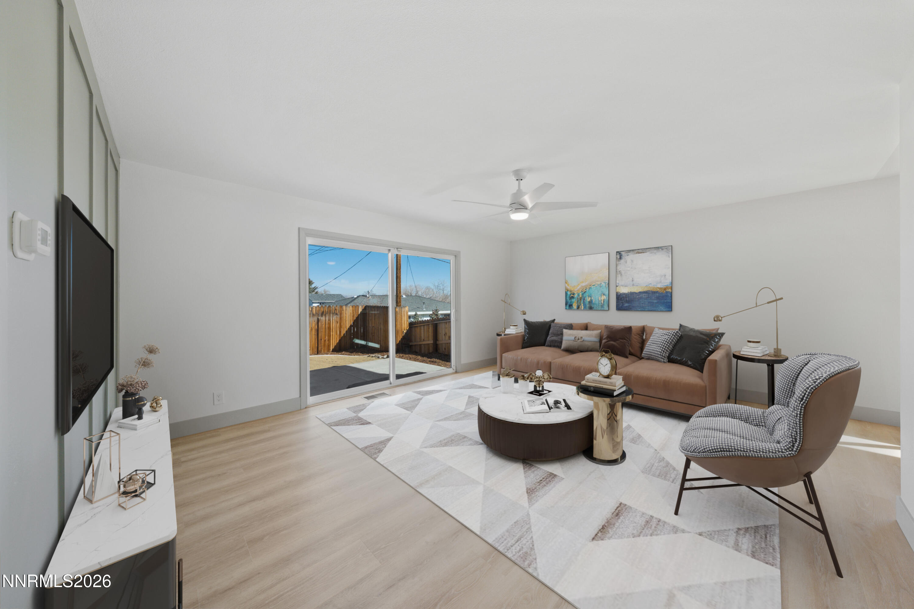 3286 Heights Drive Reno, NV 89503 - Photo 13 of 30 a living room with furniture a flat screen tv and kitchen view