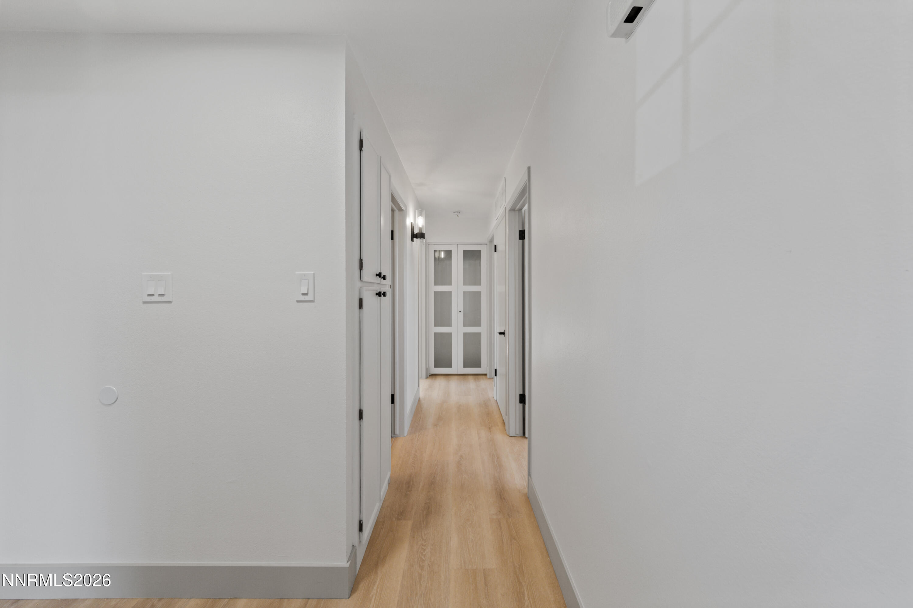 3286 Heights Drive Reno, NV 89503 - Photo 15 of 30 a view of a hallway with wooden floor