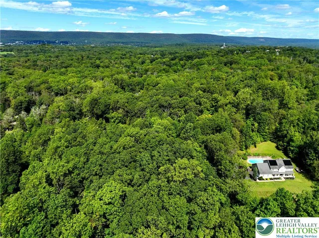a view of a yard with an outdoor space