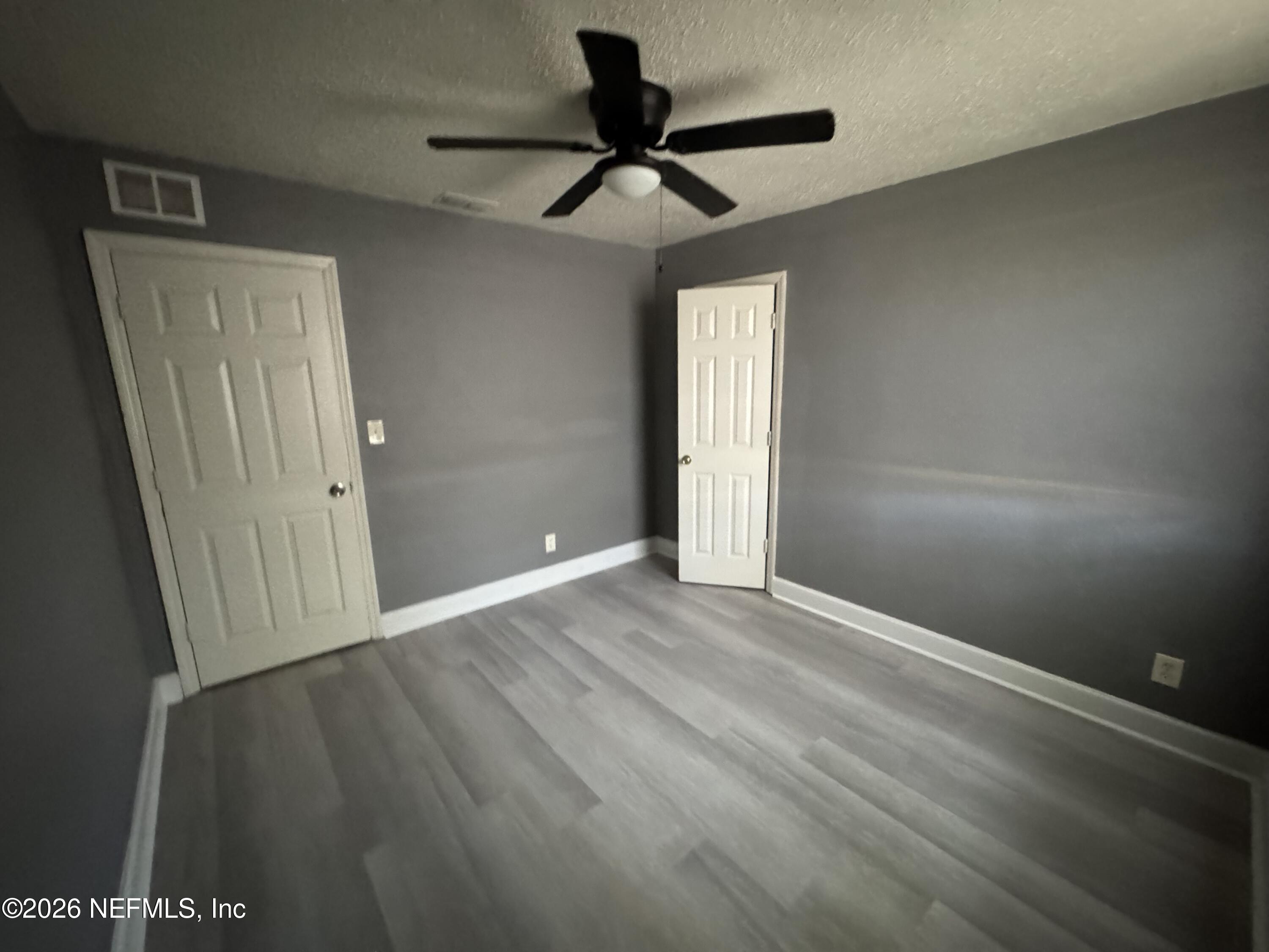 4114 Moncrief Road, Unit 2 Jacksonville, FL 32209 - Photo 12 of 20 a view of an empty room with a window