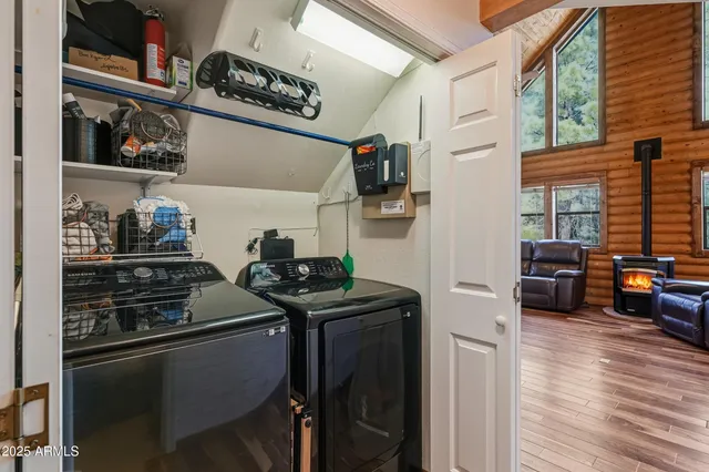 a bathroom with a granite countertop sink toilet and a mirror