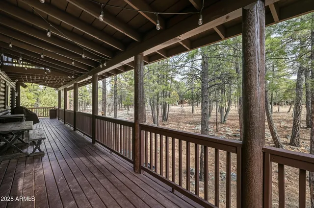 a view of house with backyard