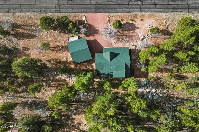 an aerial view of residential house with outdoor space