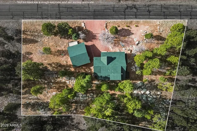 a front view of a house with a yard and seating space