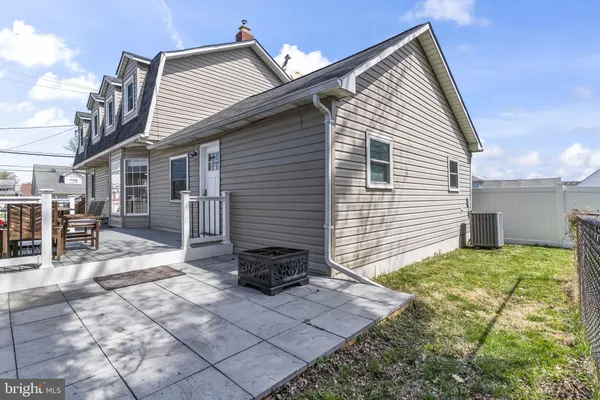 a front view of a house with parking space