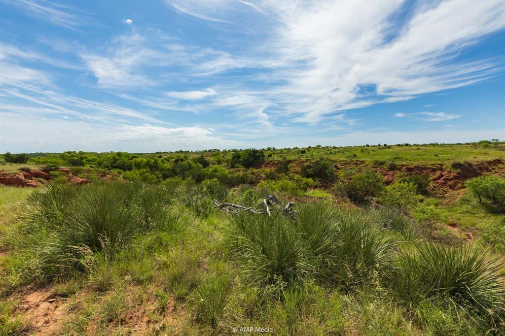 440 C R 440 Rotan, TX 79546 - Photo 14 of 33 a view of a lake with houses in back