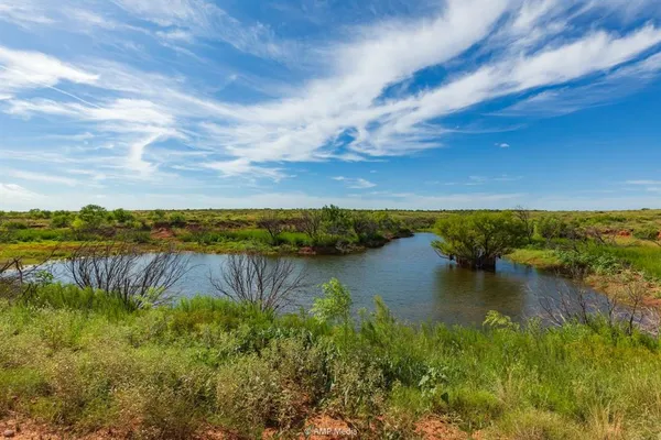 a view of a lake with outdoor space