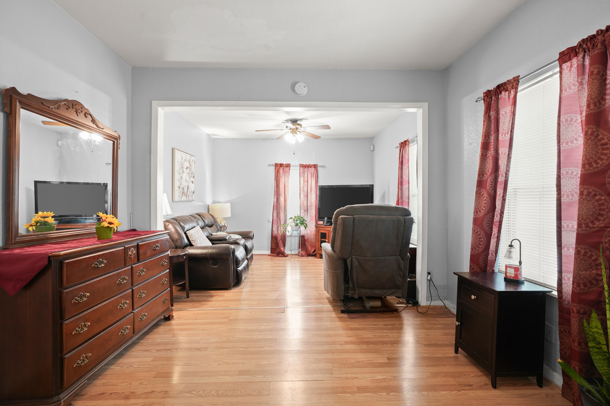 1908 Holly Street Austin, TX 78702 - Photo 11 of 22 Luminous hardwood floors extend throughout this inviting, well-lit living area.