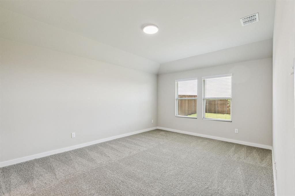 697 Poppy Lane Lavon, TX 75166 - Photo 15 of 27 an empty room with a window