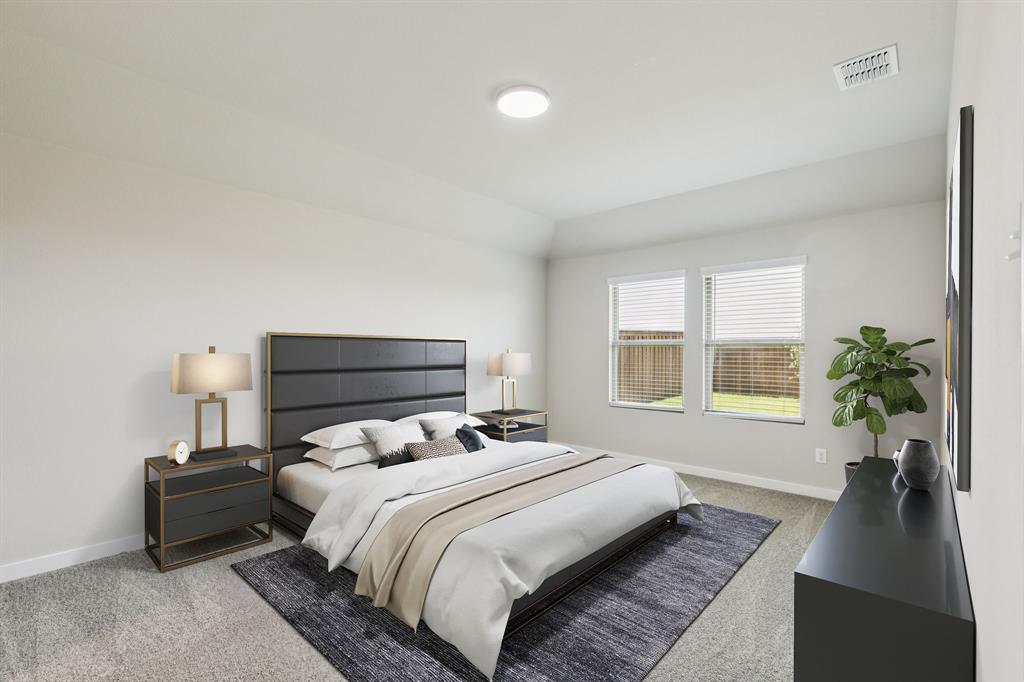 697 Poppy Lane Lavon, TX 75166 - Photo 18 of 27 a bedroom with a bed and a couch