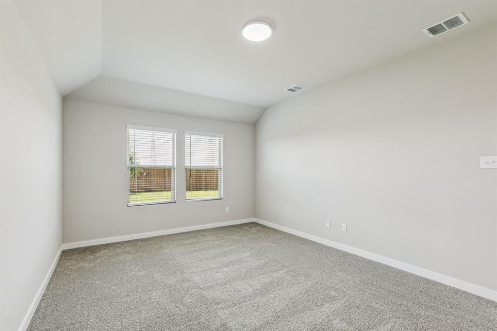 697 Poppy Lane Lavon, TX 75166 - Photo 19 of 27 an empty room with a window