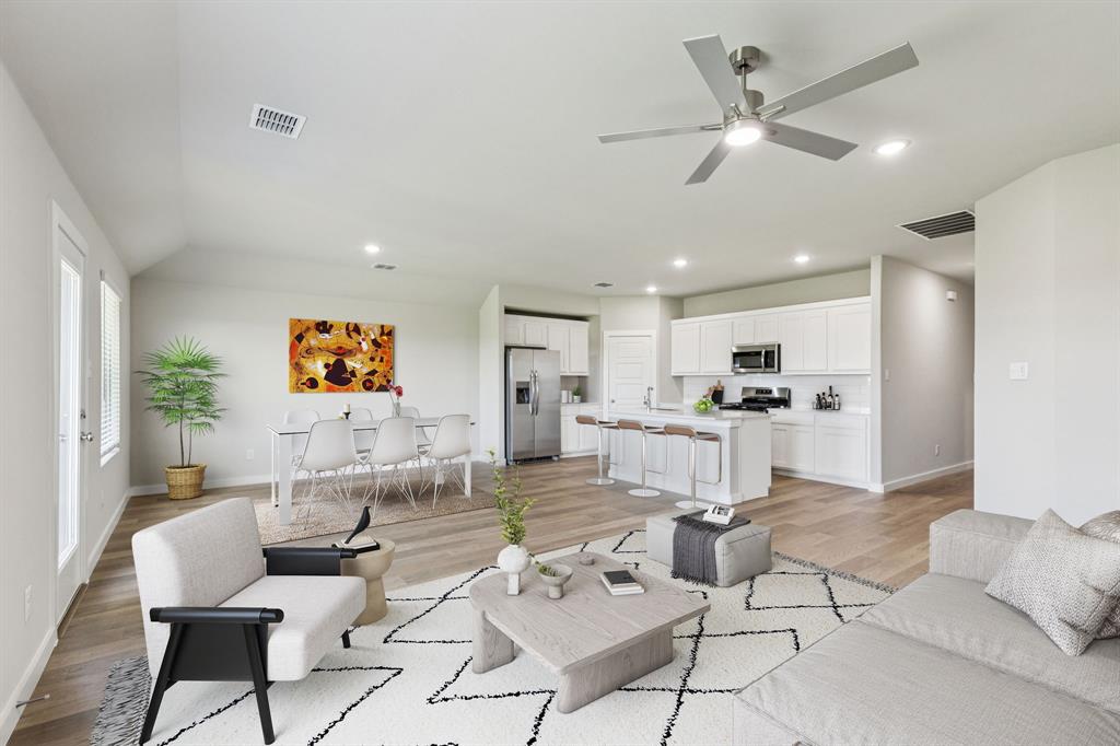 697 Poppy Lane Lavon, TX 75166 - Photo 9 of 27 a living room with furniture and kitchen view