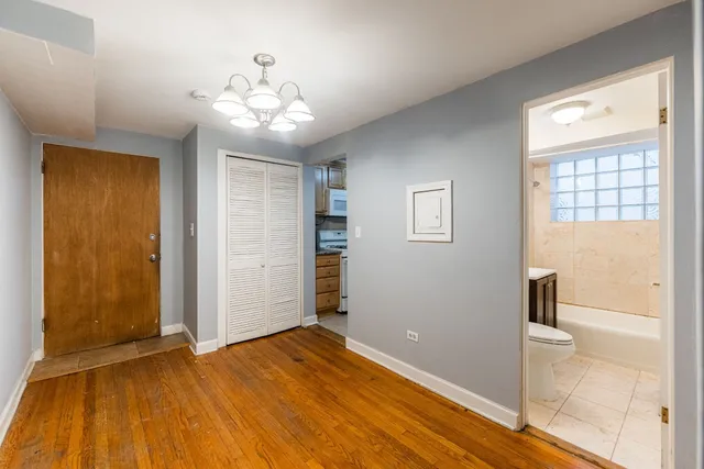 a view of an empty room with a window