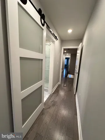 a view of entryway with wooden floor