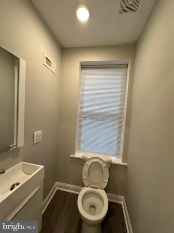 a bathroom with a sink and a toilet