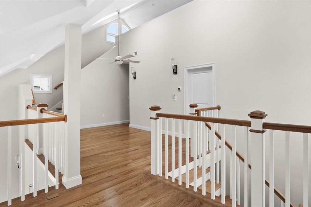 17 Courtyard Place, Unit 17 Reading, MA 01867 - Photo 11 of 12 a view of a hallway view with staircase