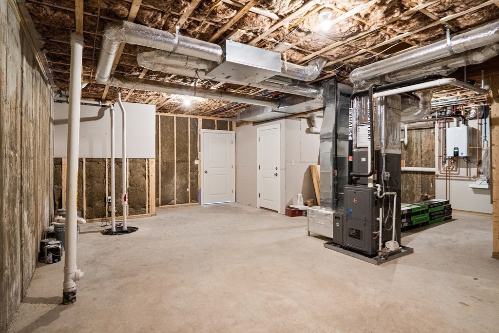 17 Courtyard Place, Unit 17 Reading, MA 01867 - Photo 12 of 12 a view of a room with gym equipment