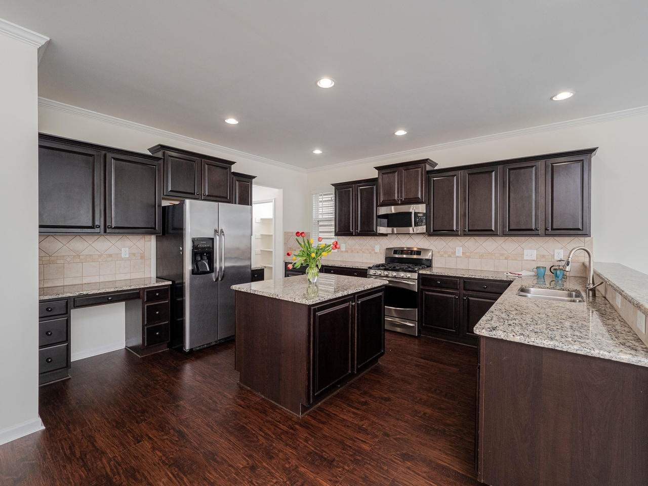 1414 Rodessa Run Raleigh, NC 27607 - Photo 8 of 30 Spacious Kitchen with Butler's Pantry
