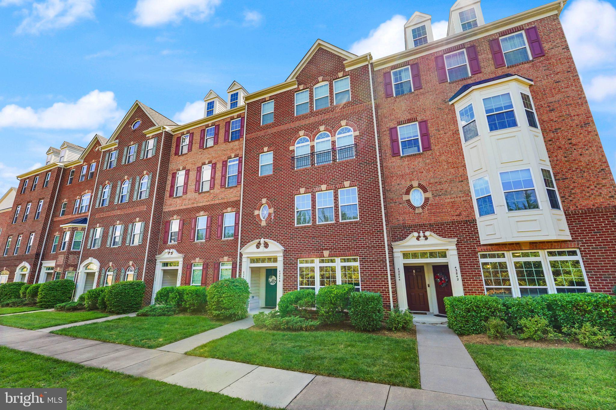 43846 Artsmith Terrace Ashburn, VA 20147 - Photo 1 of 38 a front view of a building