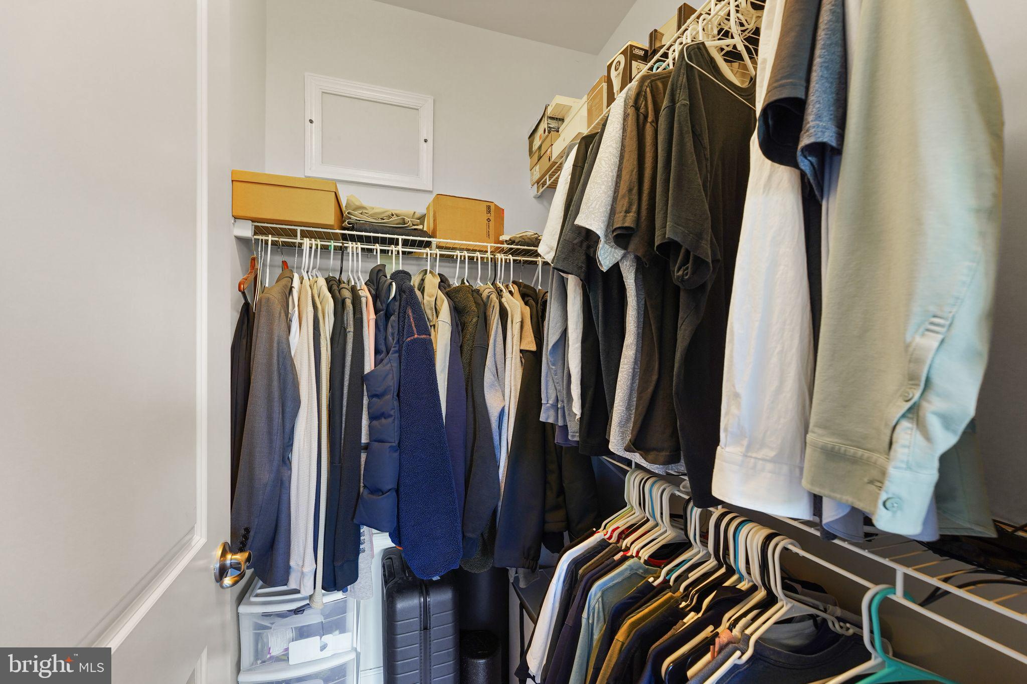 43846 Artsmith Terrace Ashburn, VA 20147 - Photo 24 of 38 a view of walk in closet with clothes