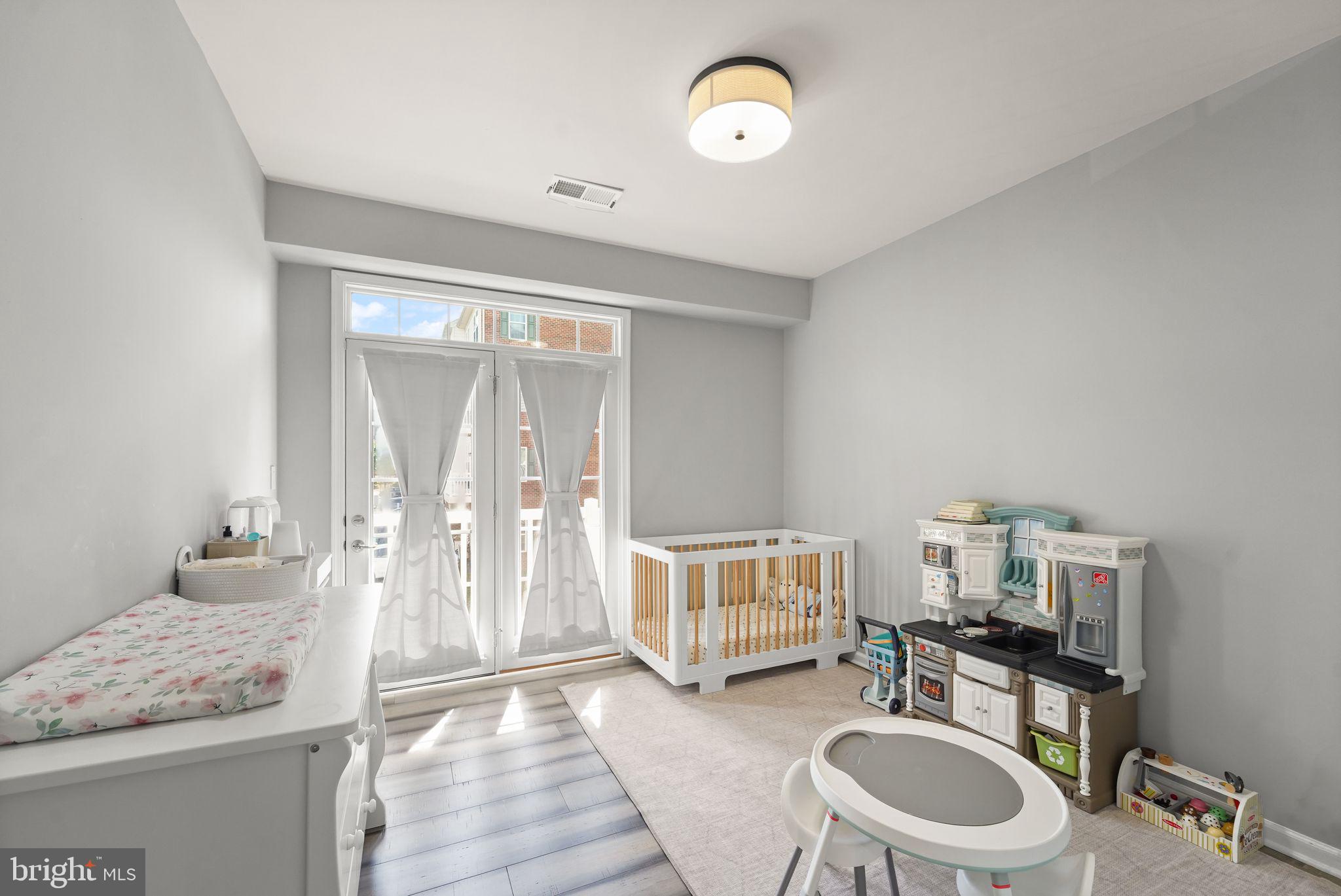 43846 Artsmith Terrace Ashburn, VA 20147 - Photo 25 of 38 a bathroom with a granite countertop sink and a mirror