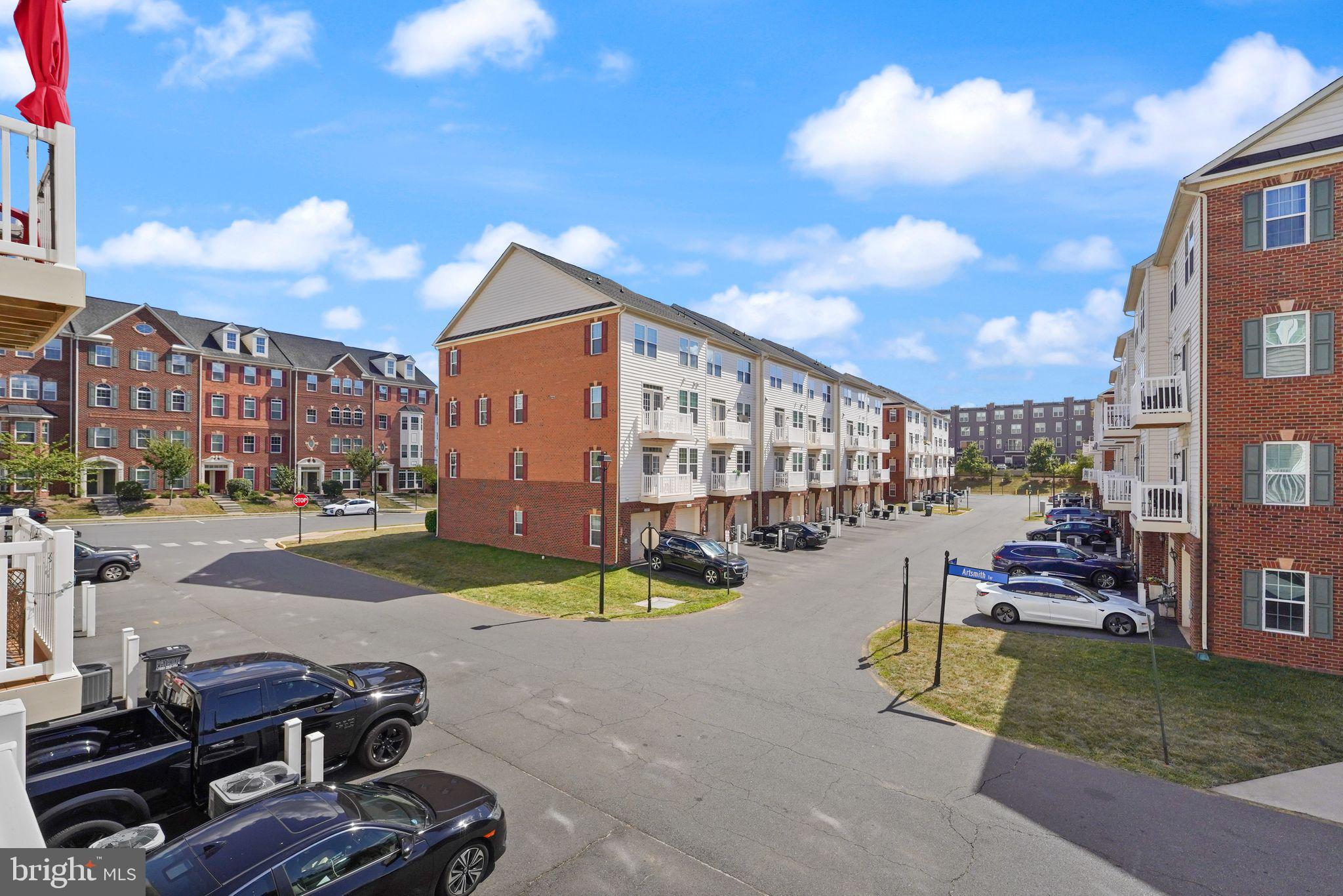 43846 Artsmith Terrace Ashburn, VA 20147 - Photo 29 of 38 a view of a house with swimming pool and sitting area