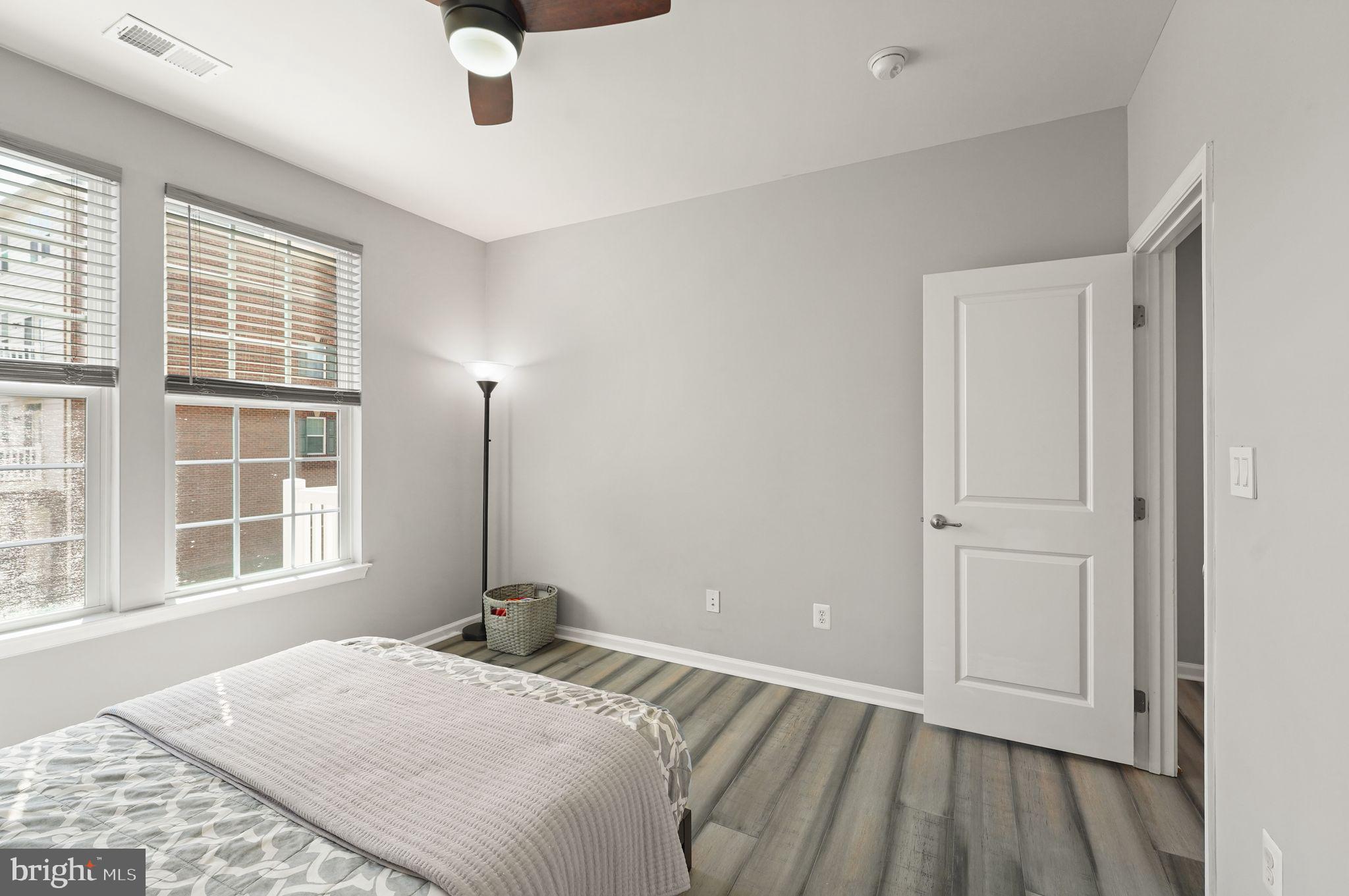 43846 Artsmith Terrace Ashburn, VA 20147 - Photo 31 of 38 a bedroom with a bed and a window