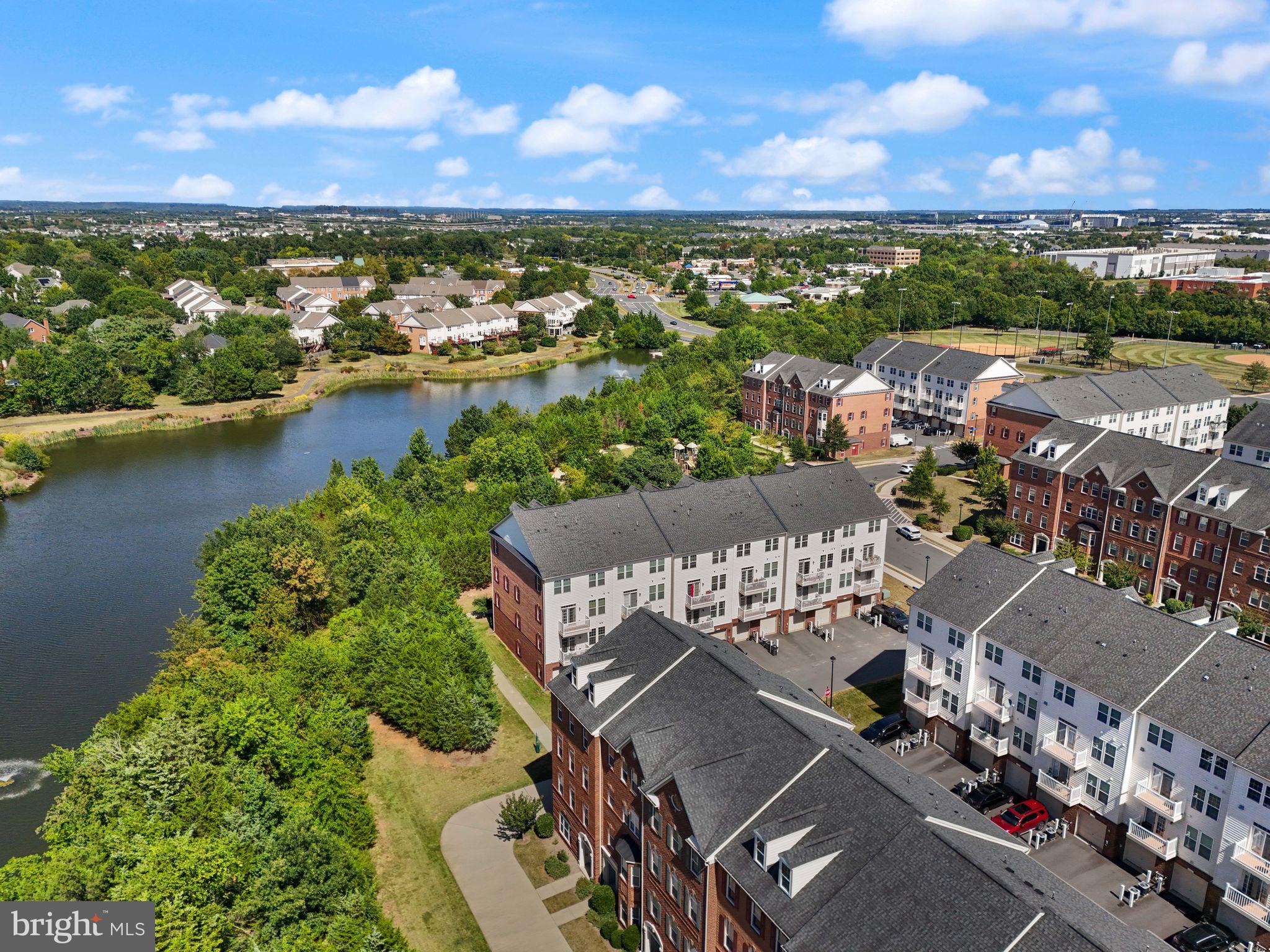 43846 Artsmith Terrace Ashburn, VA 20147 - Photo 37 of 38 an aerial view of a city with lake view