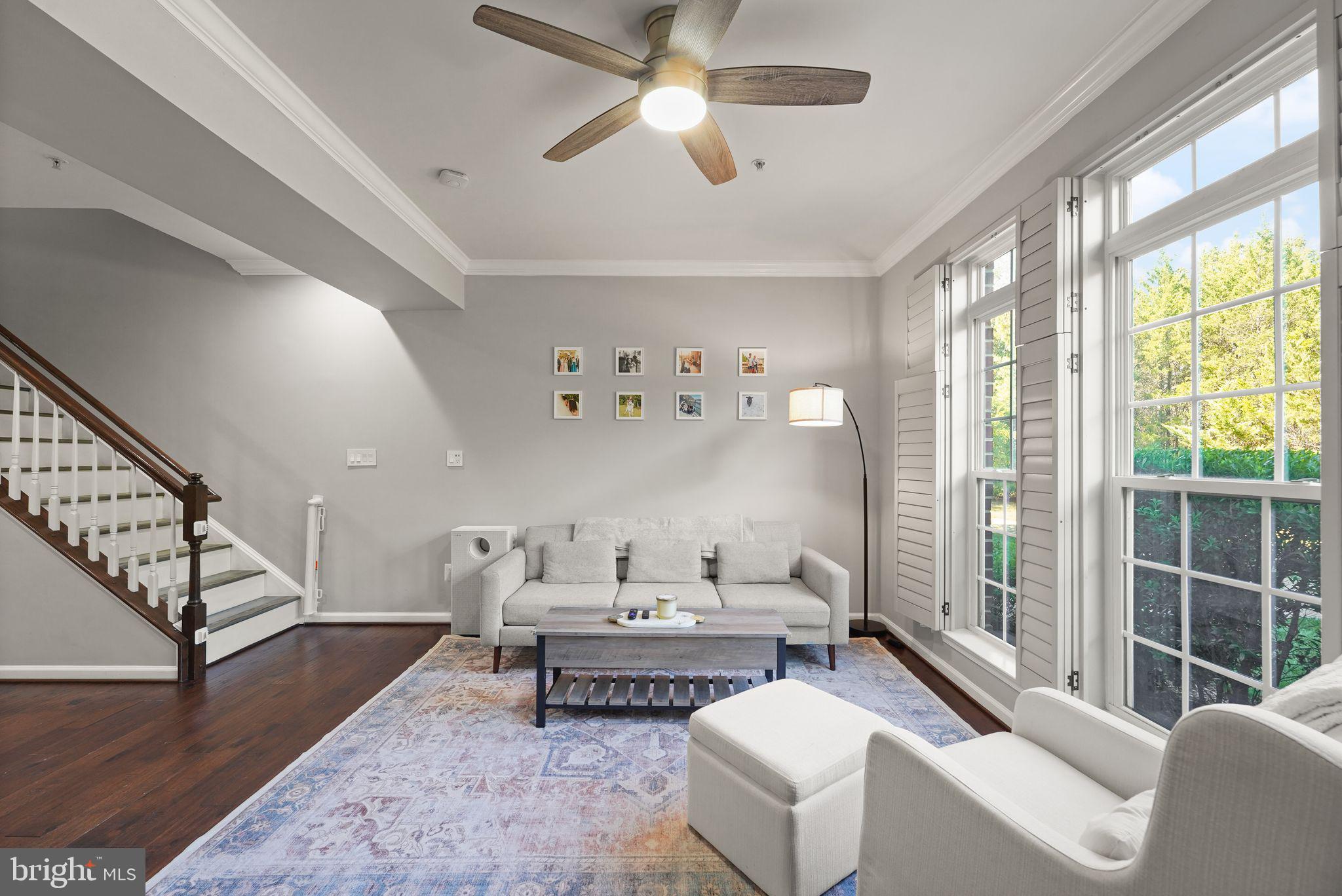 43846 Artsmith Terrace Ashburn, VA 20147 - Photo 4 of 38 a living room with furniture and a large window