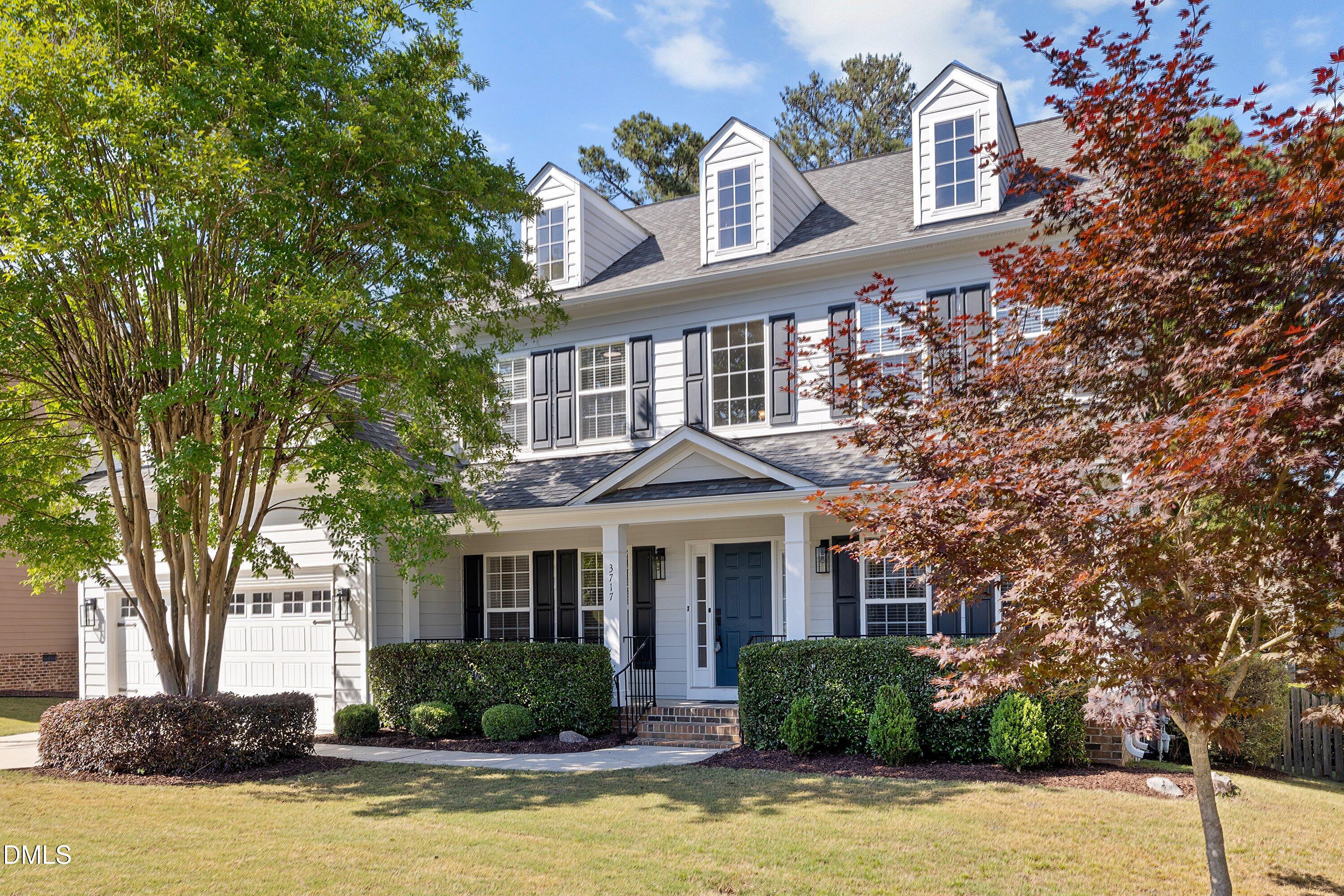 3717 Windmeade Road Wake Forest, NC 27587 - Photo 3 of 51 a front view of a house with yard swimming pool and outdoor seating