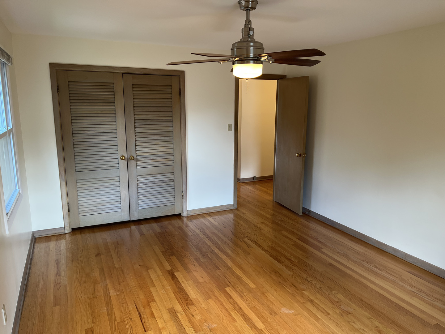 3014 Harlem Avenue, Unit 1 Riverside, IL 60546 - Photo 11 of 22 a view of empty room with wooden floor
