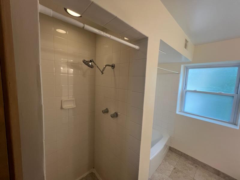 3014 Harlem Avenue, Unit 1 Riverside, IL 60546 - Photo 20 of 22 a bathroom with a shower