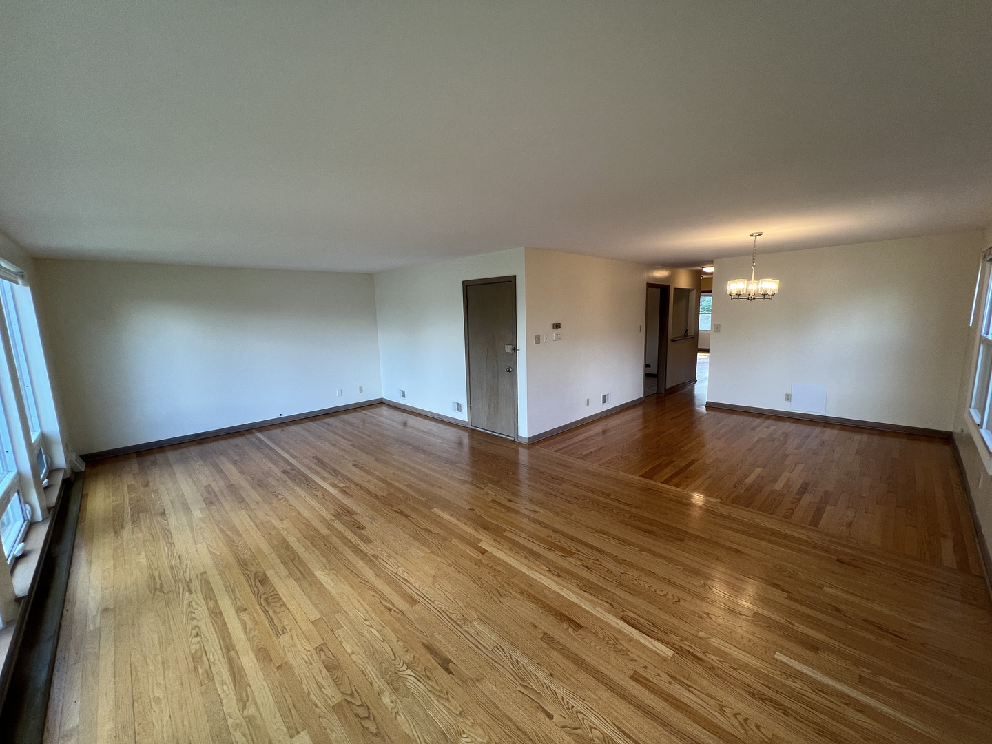 3014 Harlem Avenue, Unit 1 Riverside, IL 60546 - Photo 6 of 22 a view of empty room with wooden floor