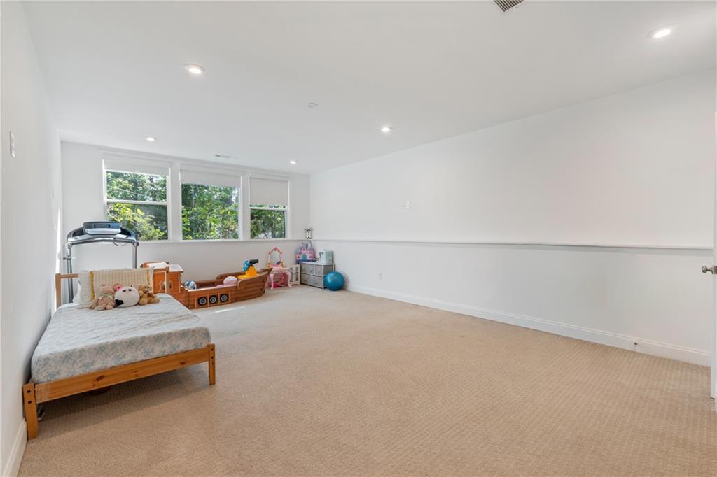 8110 Scenic Ridge Way Ball Ground, GA 30107 - Photo 11 of 29 a view of a room with furniture and a window