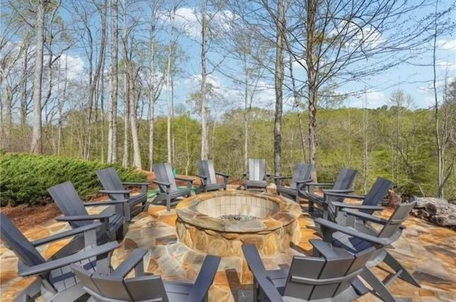 8110 Scenic Ridge Way Ball Ground, GA 30107 - Photo 28 of 29 a view of swimming pool with outdoor seating and city view