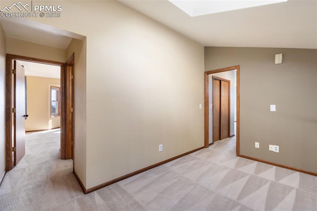 725 Bowstring Road Monument, CO 80132 - Photo 22 of 50 a view of a hallway with closet area