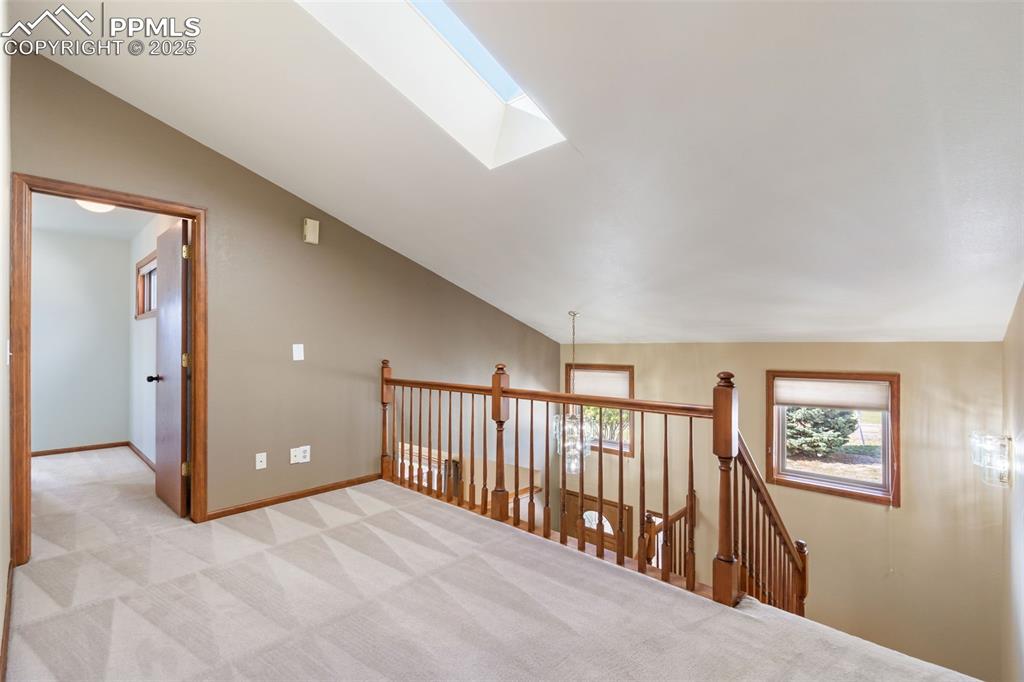 725 Bowstring Road Monument, CO 80132 - Photo 23 of 50 a view of a hallway with windows